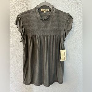 Rewind charcoal gray top, Smocked and ruffle short sleeves. Size: Medium